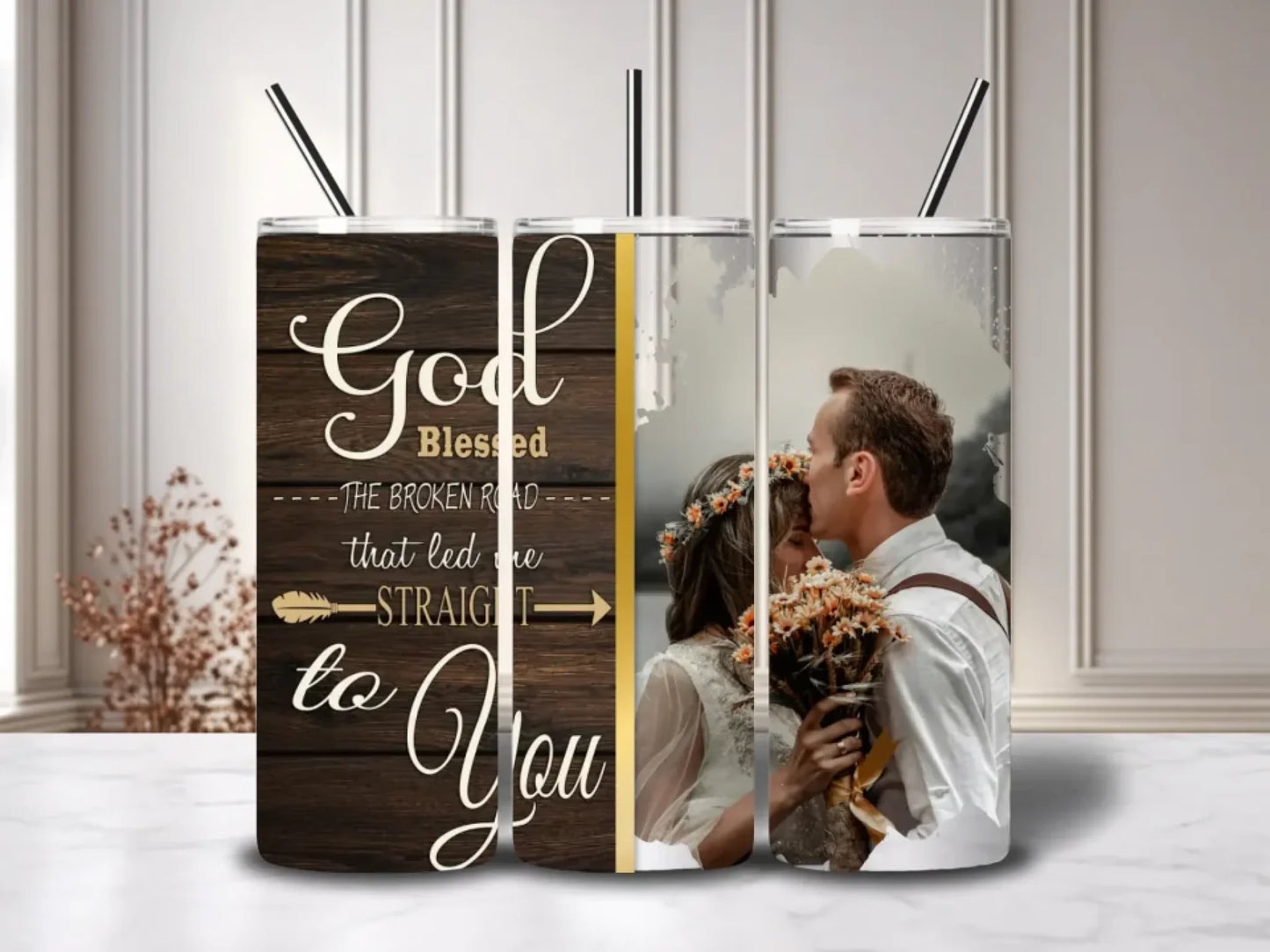 A romantic tumbler set featuring a rustic wood design with the quote "God blessed the broken road that led me straight to you" and an image of a loving couple.